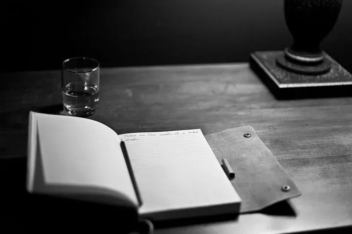 Open diary kept in a table